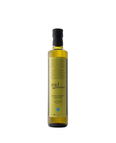 A bottle of Zejd extra virgin olive oil with a black cap and a light olive-green label, shown against a plain white background.