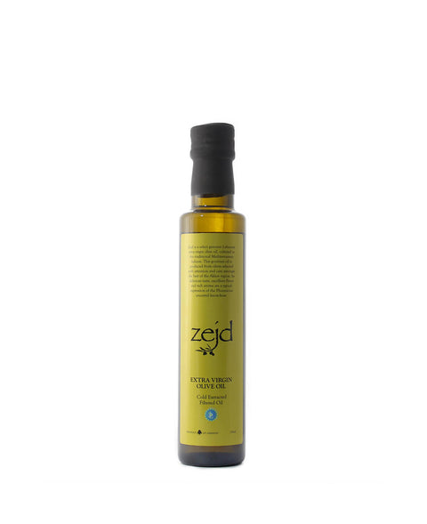 Bottle of Zejd extra virgin olive oil on a white background
