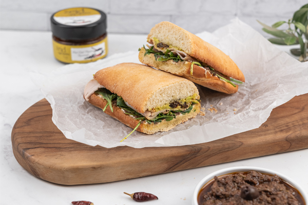 Chili Pepper Tapenade, Arugula and Turkey Sandwich